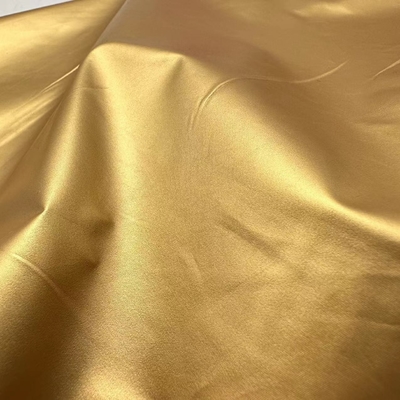 100% Polyester 104GSM Outdoor Jacket Fabric Water Resistant With Gilded Gold Fabric